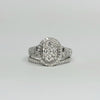 HALO DIAMOND CLUSTER ENGAGEMENT RING WITH WEDDING BAND