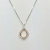 TWO TONE MOVING DIAMOND TEAR DROP NECKLACE